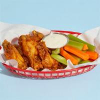 Fried Chicken Wings · (6) Bone-in wings drenched in your choice of sauce, served with celery, carrots, and blue ch...