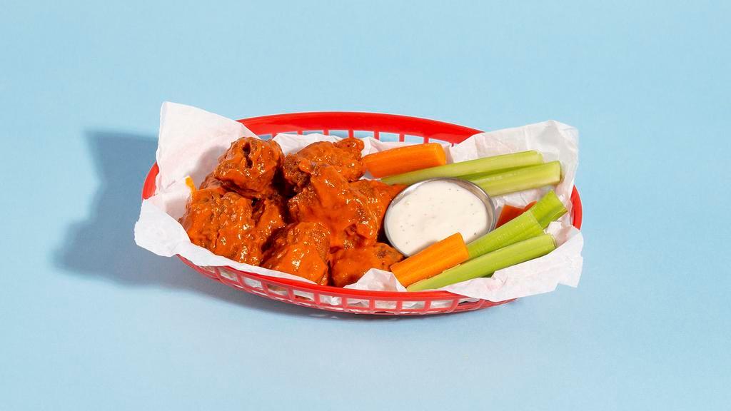 Fried Boneless Wings · (6) Boneless wings drenched in your choice of  sauce, served with celery, carrots, and blue cheese or ranch.