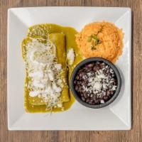 Enchiladas With Green Sauce · 3 rolled tortillas stuffed with shredded chicken, covered wtih Green Sauce topped with Oaxac...