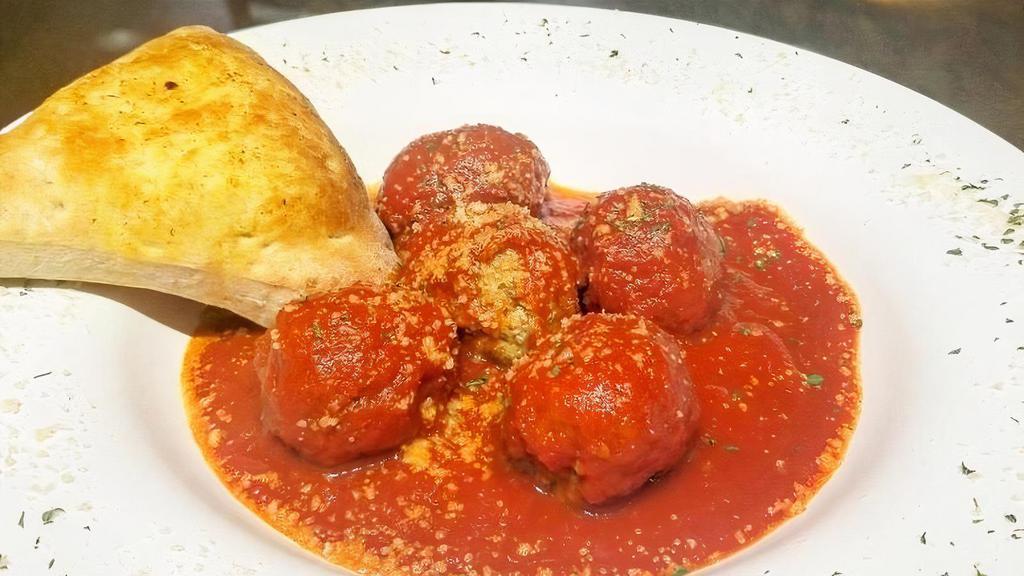 Side Of Meatballs · 5 one oz meatballs, served with tomato sauce, parmigiano cheese .