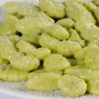Gnocchi Pesto · Potato dumplings cooked in our delicate pesto creamy sauce