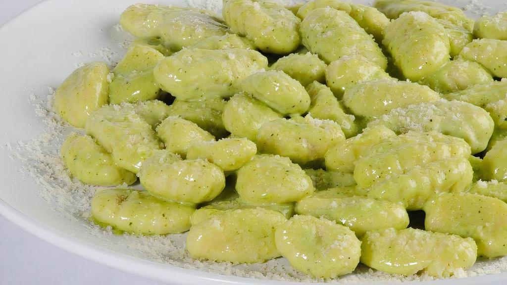 Gnocchi Pesto · Potato dumplings cooked in our delicate pesto creamy sauce
