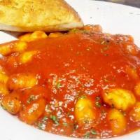 Gnocchi Napoli · Potato dumplings cooked in our delicate tomato sauce