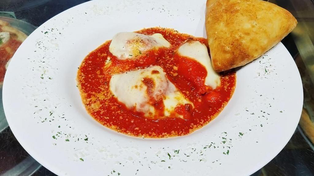 Stuffed Shells · Seasoned ricotta & parmigiano cheese stuffed in large pasta shells (3count) and topped with our delicate tomato sauce & mozzarella cheese