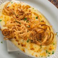Kaesespaetzle · German-style macaroni baked with three cheeses, topped Viennese fried onions.