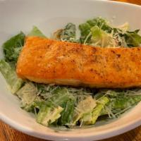 Grilled Salmon  Caesar Salad  · Rudi's Signature Caesar Salad topped with Grilled Salmon