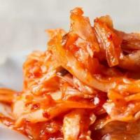 Kimchi · 辣泡菜  Mix of fermented vegetables.