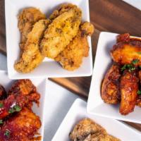 30 Pc Wings · Served with two fries, two kale coleslaw and Korean pickled radish. Choose up to three flavo...
