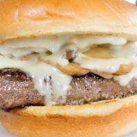 Mushroom & Swiss Burger · Charbroiled burger with grilled mushrooms topped with Swiss cheese on a toasted brioche bun ...