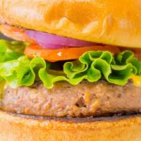 Beyond Meat Burger · Charbroiled Beyond Meat patty served on a toasted brioche bun with lettuce, tomato, onion an...
