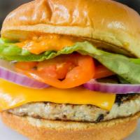 Turkey Burger · Charbroiled turkey patty served on a toasted brioche bun with lettuce, tomato, onion and chi...