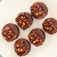 Mini Flourless Brownies · Gluten free. Contains dairy and eggs. Dense, fudgy and crunchy, our flourless brownies are s...