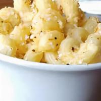 Side Mac N Cheese · Vegetarian. Cavatappi pasta tossed in our creamy cheddar and Parmesan cheese sauce. Topped w...