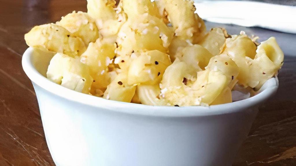 Side Mac N Cheese · Vegetarian. Cavatappi pasta tossed in our creamy cheddar and Parmesan cheese sauce. Topped with toasted panko bread crumbs.720 cal.