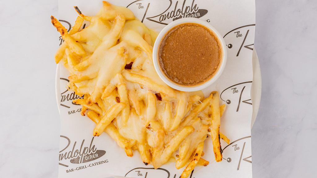 Disco Fries · Regular, waffle, or curly fries topped with mozzarella cheese and brown gravy.