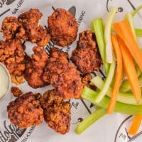 Boneless Wings · Hot, mild, bbq, honey bbq, teriyaki or lemon pepper. Served with Bleu cheese dressing, celer...