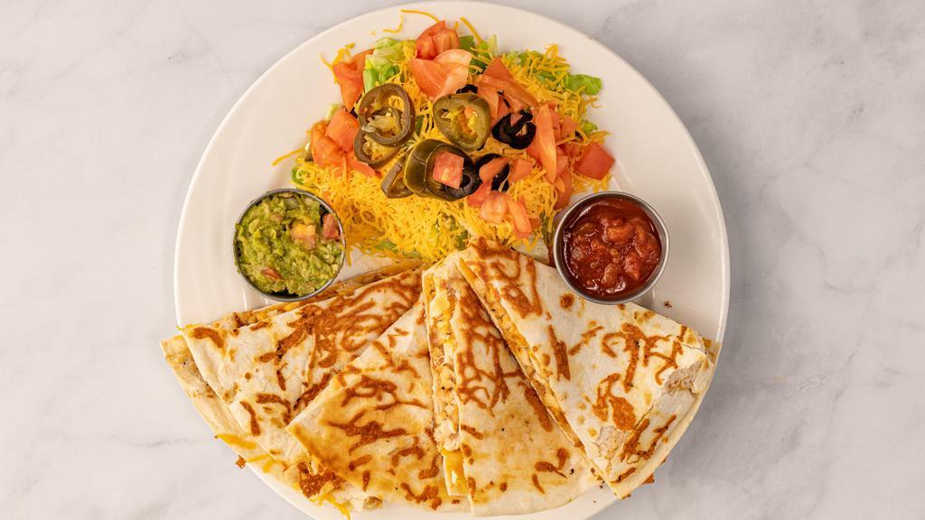 Chicken Quesadilla · Melted Cheddar cheese. Served with guacamole, salsa, and sour cream cheese.