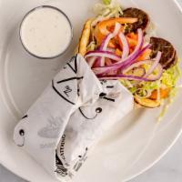 Gyro Sandwich · Grilled lamb strips with lettuce, tomato, onion, and tzatziki sauce wrapped in pita bread. S...
