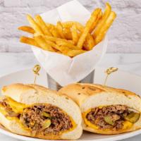 Philly Cheese Steak Sandwich · American cheese, peppers, mushrooms, and onions on a hoagie roll. Served with French Fries.