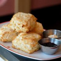 Buttermilk Biscuits · Scratch-made biscuits served with house-churned North Dakota honey butter and seasonal prese...