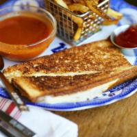 Grilled Cheese & Tomato Soup · White cheddar, muenster, gruyère on our soft scratch-made bread. Served with our tomato soup...