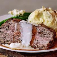 Meatloaf & Gravy · A blend of beef and veal mixed with mushrooms and panko breadcrumbs, topped with white & bro...