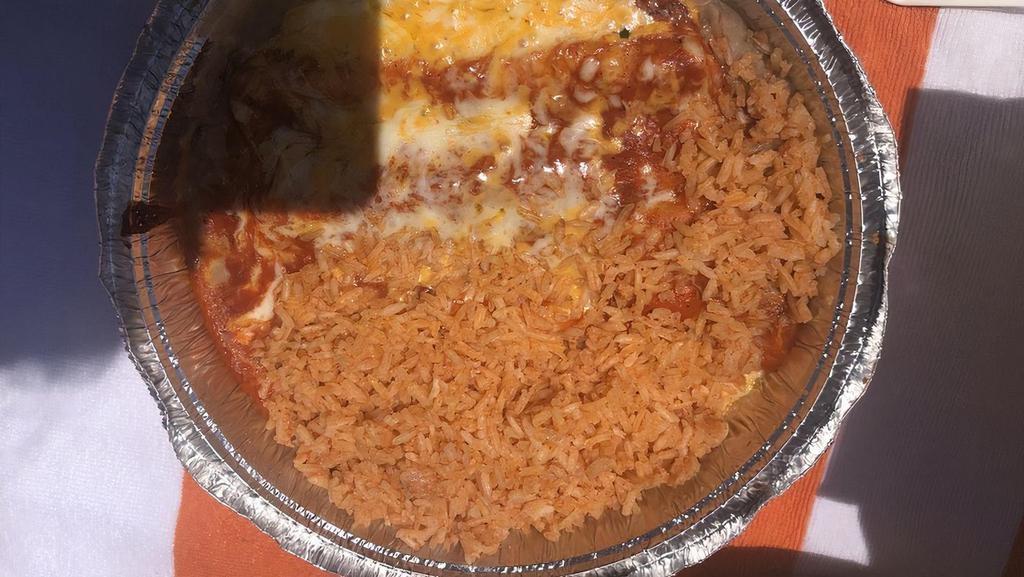 Carne Enchiladas · Corn Tortilla with cheese and meat inside, topped with salsa Roja or Verde and cheese.
Served with rice and black beans