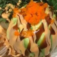 Dinosaur Eggs · Chopped up shrimp tempura and spicy crab tobiko wrapped in avocado with spicy mayo and eel s...