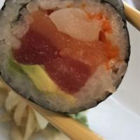 Triple Roll · Tuna, yellowtail, salmon, avocado and tobiko.