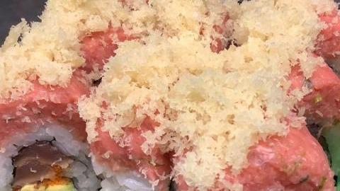 Tuna Lover Roll · Pepper tuna, avocado, tobiko inside; topped with spicy tuna (tempura flakes on top).