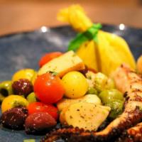 Polipo · Grilled octopus, heirloom tomatoes, potatoes, celery, Gaeta olives, EVOO.