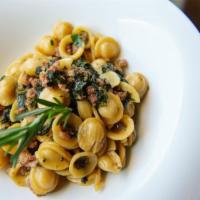 Orecchiette · Ear-shaped pasta, crumbled fennel sausage, roasted garlic broccoli rabe, Parmigiano Reggiano...