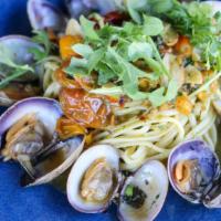 Linguine Con Vongole & Arugul · Manila clams, oven-roasted tomatoes, garlic, EVOO, arugula pesto.
