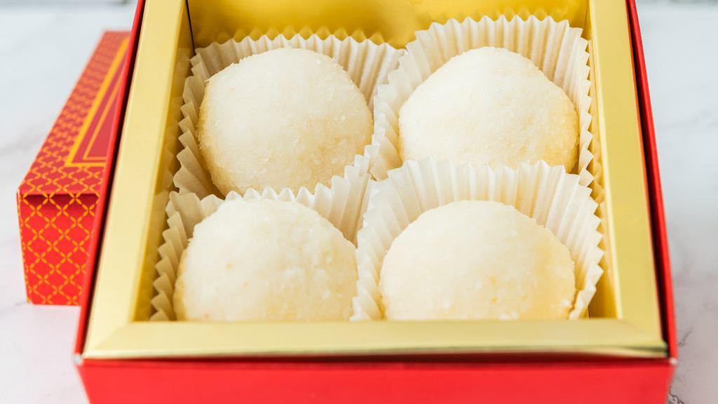 Coconut Laddu (4 Piece) · A popular Indian delicacy made with Coconut. A must-try for all coconut lovers.