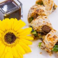 Duck Roll · Cooked marinated duck cucumber end saloon wrap in rei wrapper