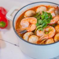 Lemongrass Soup (Tom Yum) · Spicy. Thai style soup simmered with mushrooms lemon grass and a touch of Thai pepper