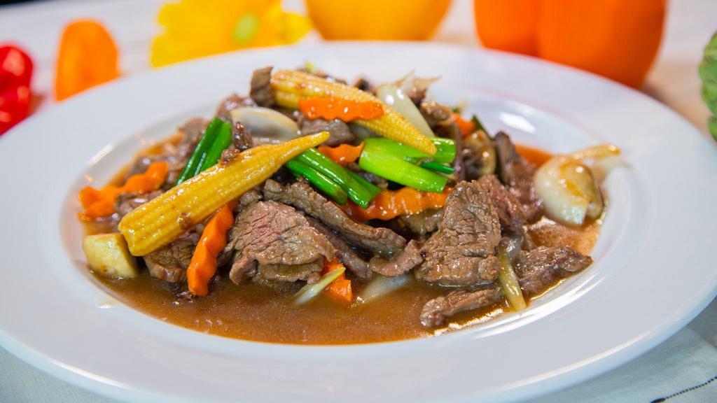 Beef With Oyster Sauce · Stir fried beef with oyster sauce mushrooms carrot onions and green peppers