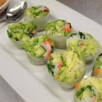 Thai Garden Rolls (2) · Thai herb chicken and fresh veggies wrapped inside a clear spring roll skin served with spec...
