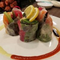 Fresh Spring Roll · Tuna, salmon, and shrimp with cucumber, lettuce, flying fish roe wrapped with rice paper and...