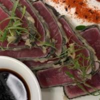 Tuna Tataki · Thinly sliced seared tuna, served with ponzu sauce.