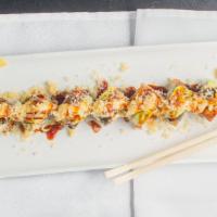 Sharon Roll · Our California roll topped with eel, avocado, tempura flakes, mayo and eel sauce.
