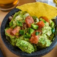 Guacamole Dip · Hand-scooped avocado with fresh jalapeño, fresh pico, zesty lime juice and warm fried tortil...