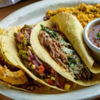 Tres Hermanos · Our best three tacos: 1. Fish with chipotle aioli, grilled pineapple and purple cabbage; 2. ...