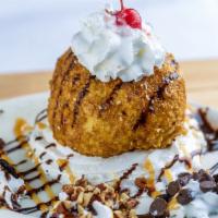 Huckleberry Fried Ice Cream · Made with fresh huckleberry and vanilla ice cream, lightly battered with corn flakes, chili ...