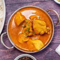 Murgh Curry · Premium boneless chicken cooked in specially prepared sauce made with different Himalayan he...