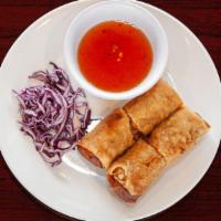 Fried Egg Rolls · Fried pork egg rolls. Comes with two rolls and served with homemade fish sauce.