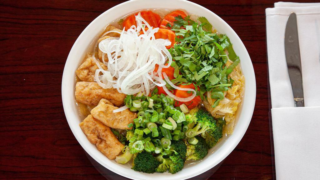 Vegetable & Tofu Phở · Served with steamed vegetables (broccoli, carrots, and napa cabbage) and fried tofu. With choice of vegetable, chicken, beef or spicy Bún bò huế (BBH) broth.