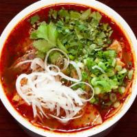 Bún Bò Huế  (Bbh) · With a choice of style: Beef & pork spicy noodle soup (American style) OR Beef, pork, congea...