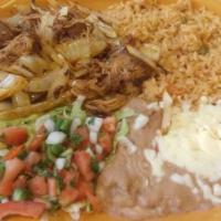 Burrito Jalisco · Grilled chicken + steak + rice + beans + topped with shrimp + queso + chorizo + pineapple.