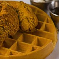 Chicken And Waffle · Breakfast and Lunch on one plate. Our tender white meat chicken pieces on top of the OPH Gol...